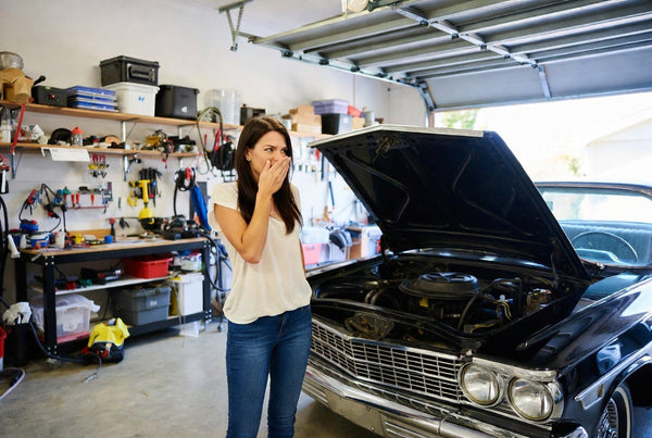 a woman in a stinky garage