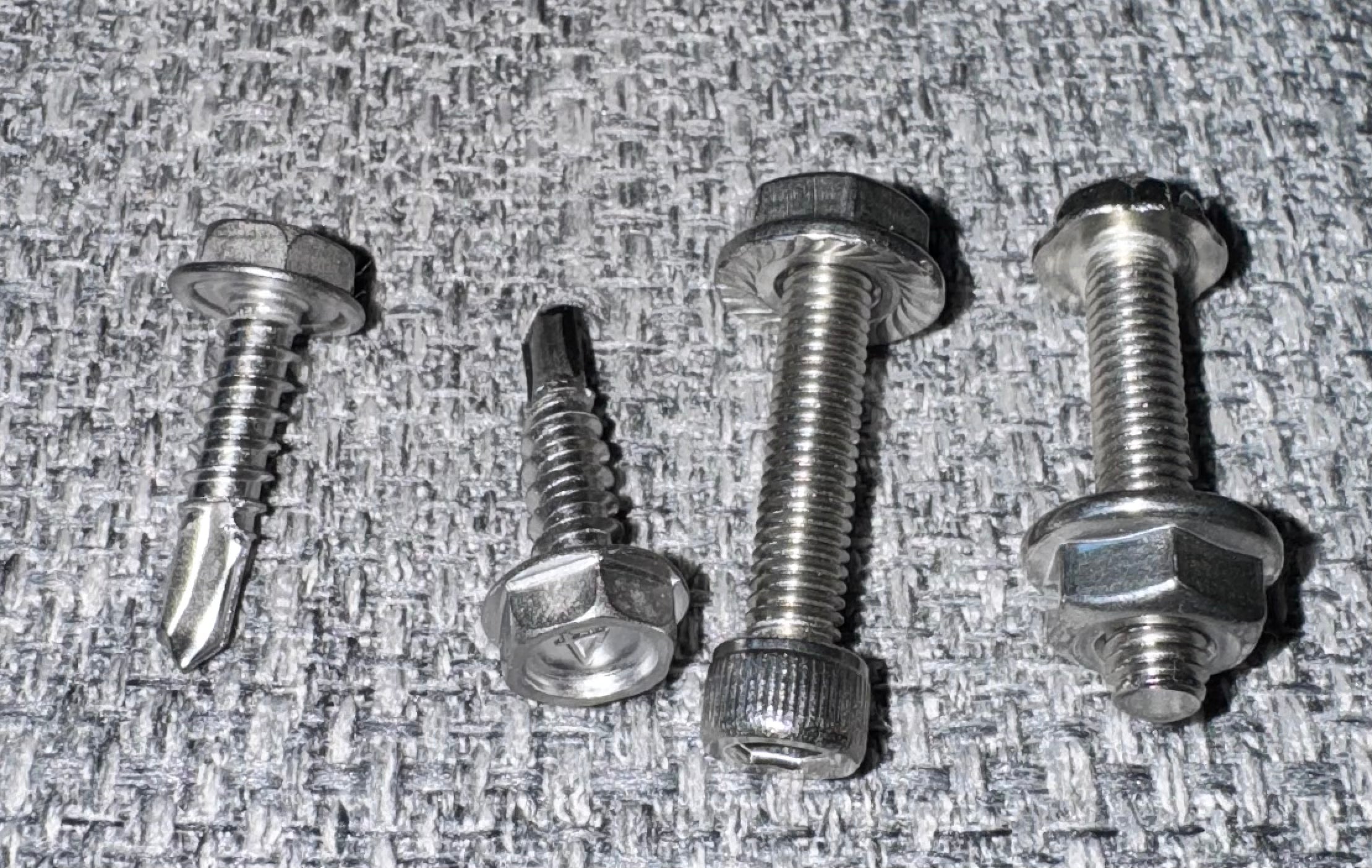 Stainless mounting screw kit for Vapor Trapper installation - close-up detail